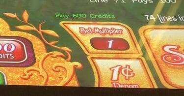 Denomination button slot machine Munchkinland