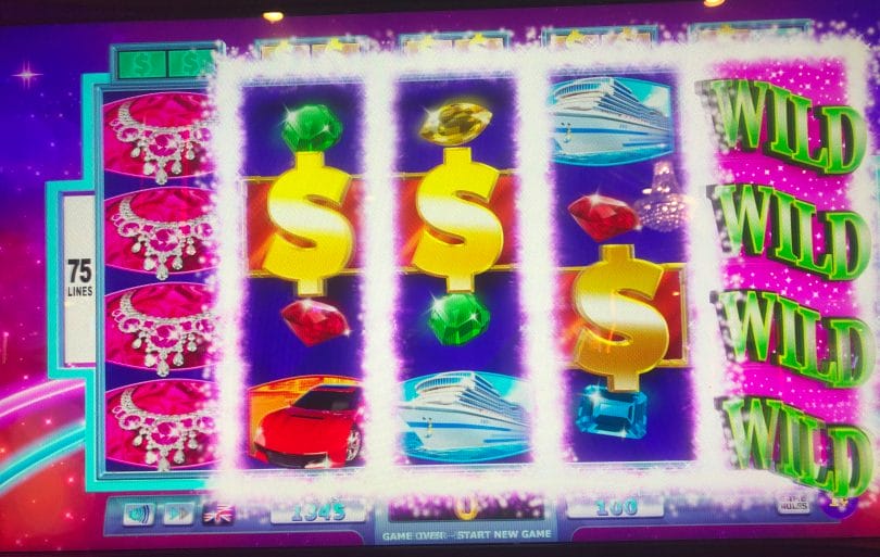 Wheel of Fortune 4D three dollar signs