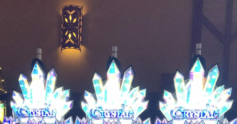 Slot machine candles on top of machine