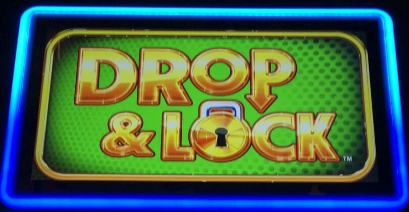 Drop & Lock by Scientific Games logo