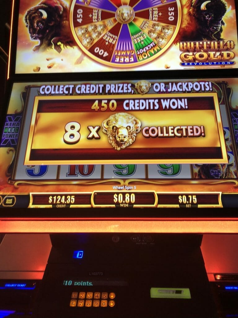 Buffalo Gold Revolution by Aristocrat four symbols wheel and credits