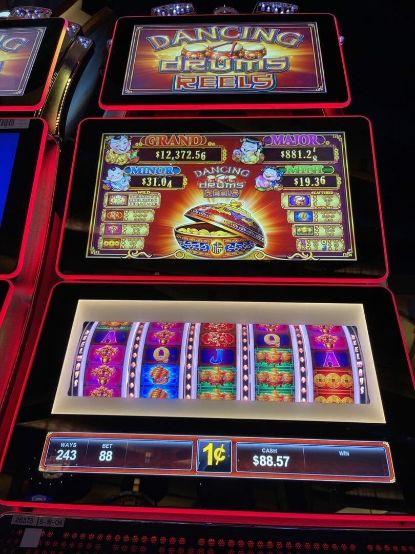 Dancing Drums Reels by Scientific Games logo