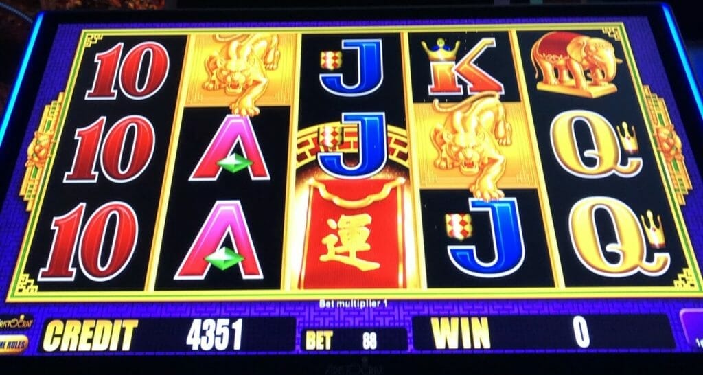 5 Coin Frenzy Jackpots by Aristocrat two bonus symbols