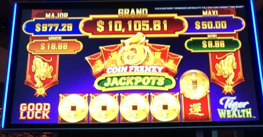 5 Coin Frenzy Jackpots by Aristocrat 5th coin lands