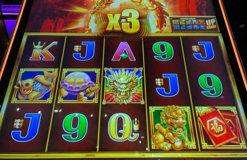 5 Dragons Rising Jackpots by Aristocrat 3x line hit