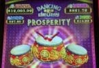Dancing Drums Prosperity by Scientific Games logo and progressives