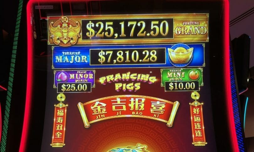 Prancing Pigs by Scientific Games logo and progressives