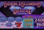 Double Diamond Deluxe by IGT pay table and logo