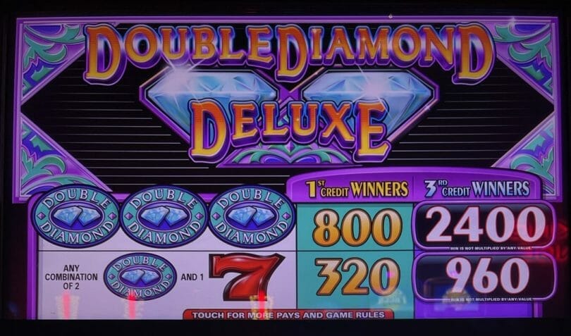 Double Diamond Deluxe by IGT pay table and logo
