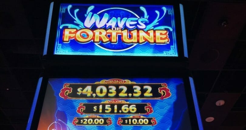 Waves of Fortune by Bluberi logo and progressives