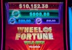 Wheel of Fortune Wild Spin by IGT logo and progressives