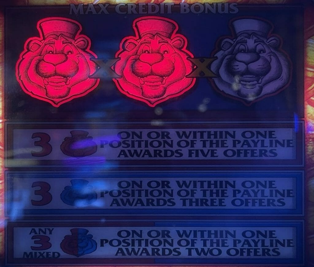 King Cash by IGT two red lion heads