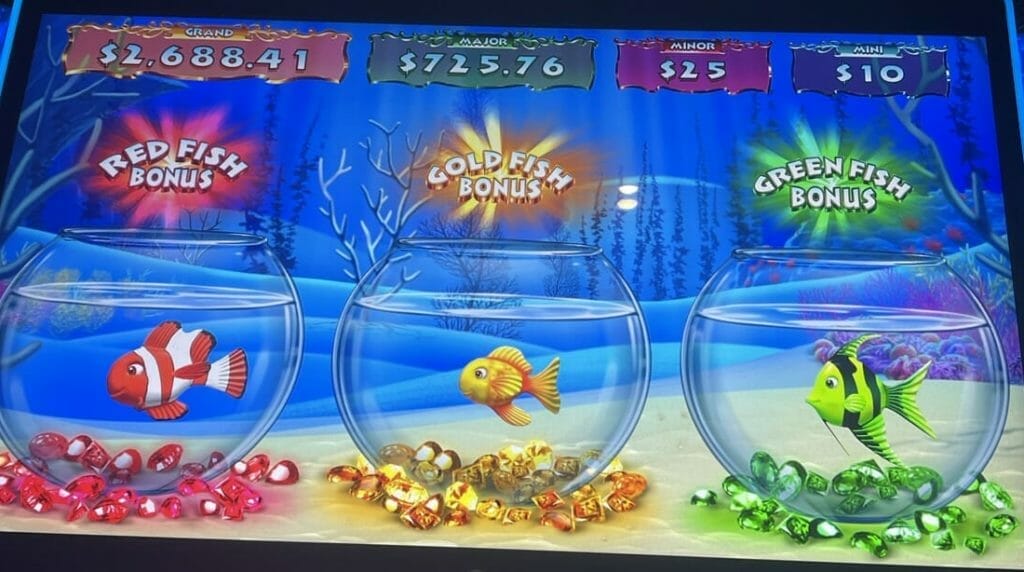 Gold Fish Feeding Time Treasure by Light and Wonder three fish bowls