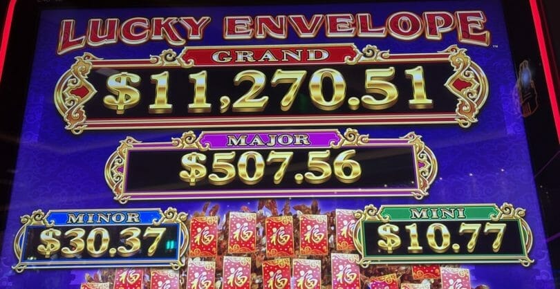 Lucky Envelope by Konami logo and progressives