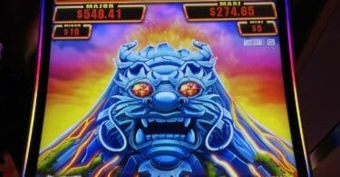 Wild Fireball Rumble by Aristocrat progressives and logo