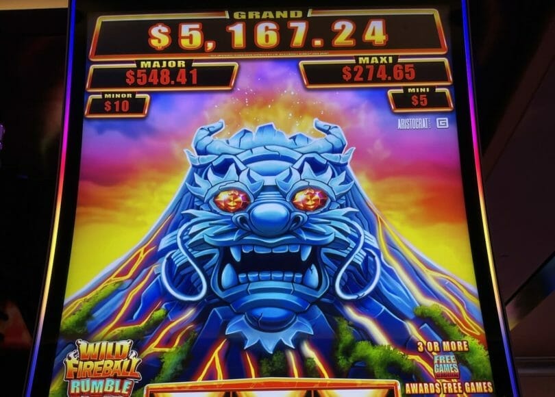 Wild Fireball Rumble by Aristocrat progressives and logo