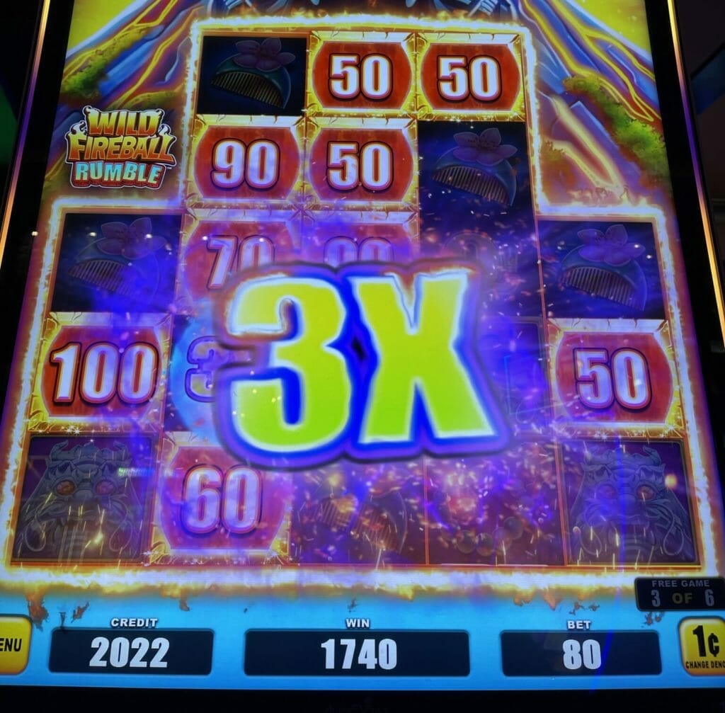 Wild Fireball Rumble by Aristocrat fireball rumble feature 3x multiplier