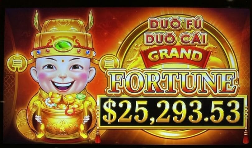 Duo Fu Duo Cai Grand by Light & Wonder logo and top progressive