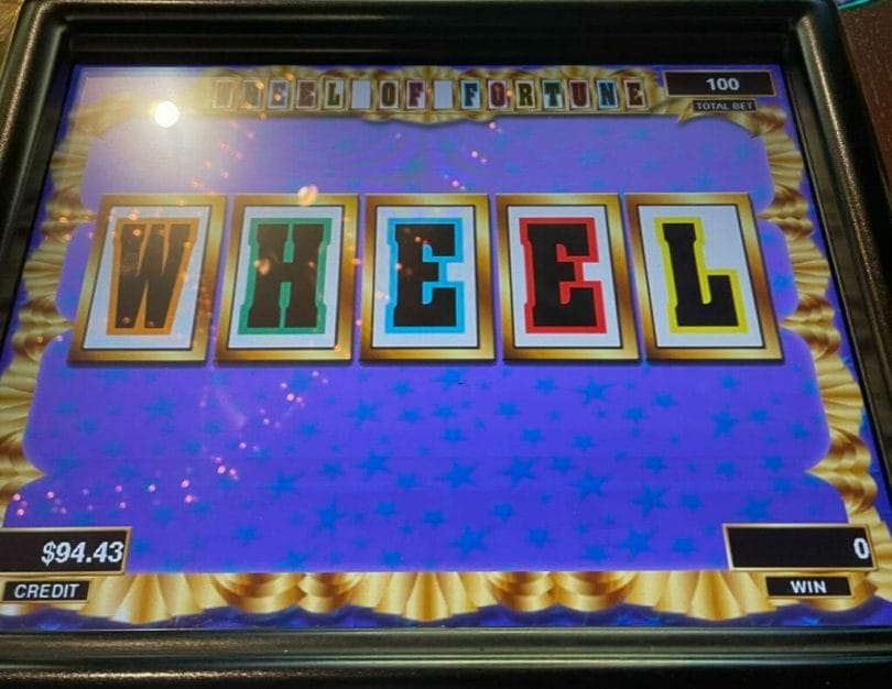 Wheel of Fortune video slot machine by IGT select letter